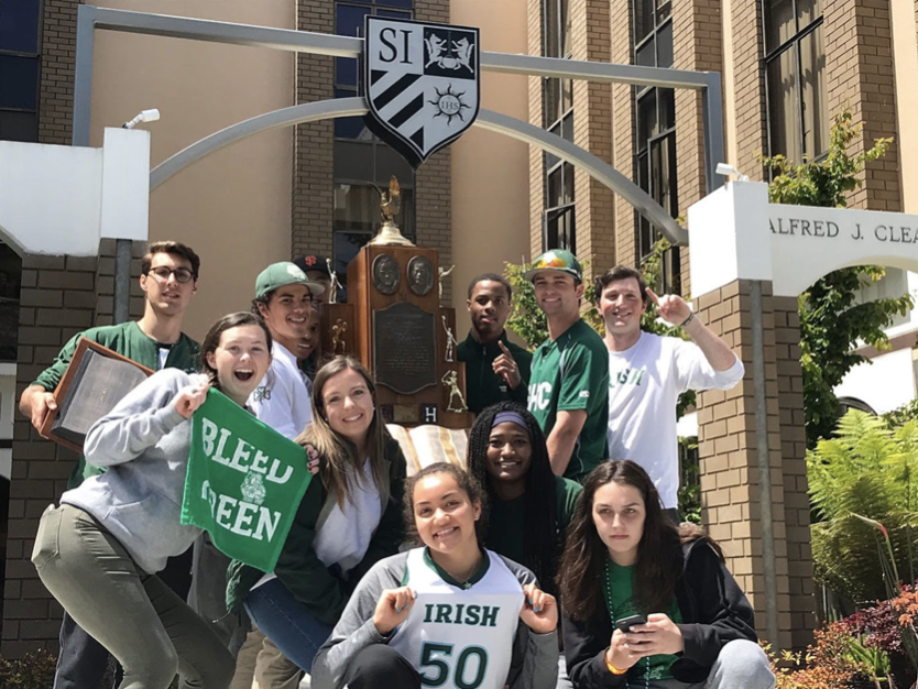 SHC athletes retrieve the Bruce-Mahoney trophy from Saint Ignatius in 2018.