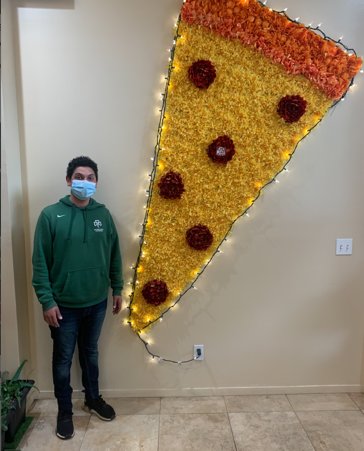 Saif Haddad '23 at Pizza Due; his family owned and operated pizzeria. 