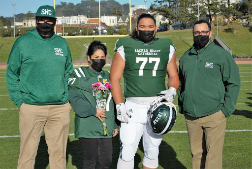 Geoffrey Hester ‘21 celebrating Senior Night with his family.