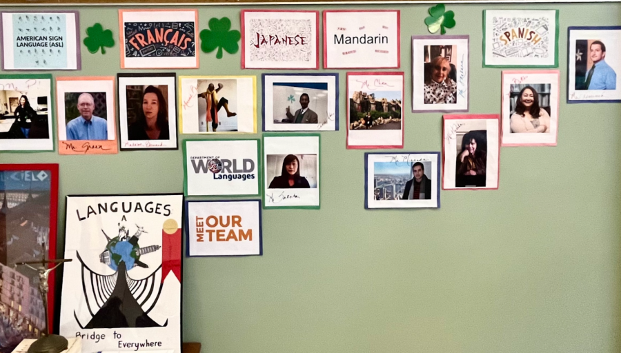 The World Language wall display on DePaul contains photos of the language team and colorful artwork depicting global languages.   