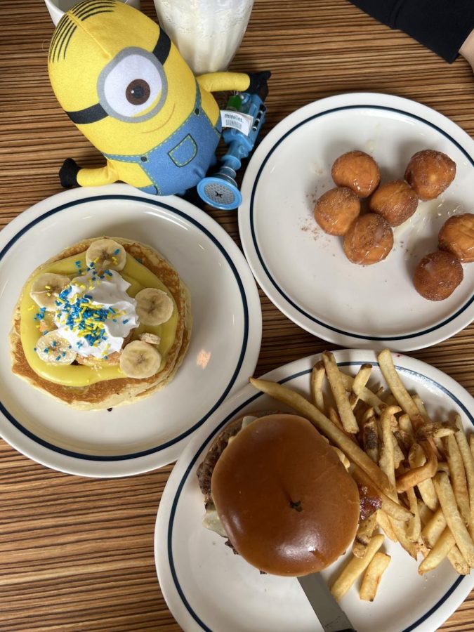 IHOPs exclusive Minions Menu items, including movie-inspired dishes like the Ba-ba-banana Pudding Pancakes, Cinna-minions, and Gru’s Evil Steakburger. 