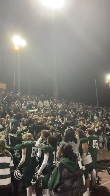 Irish fans embrace the football players after taking the win over the Wildcats!
