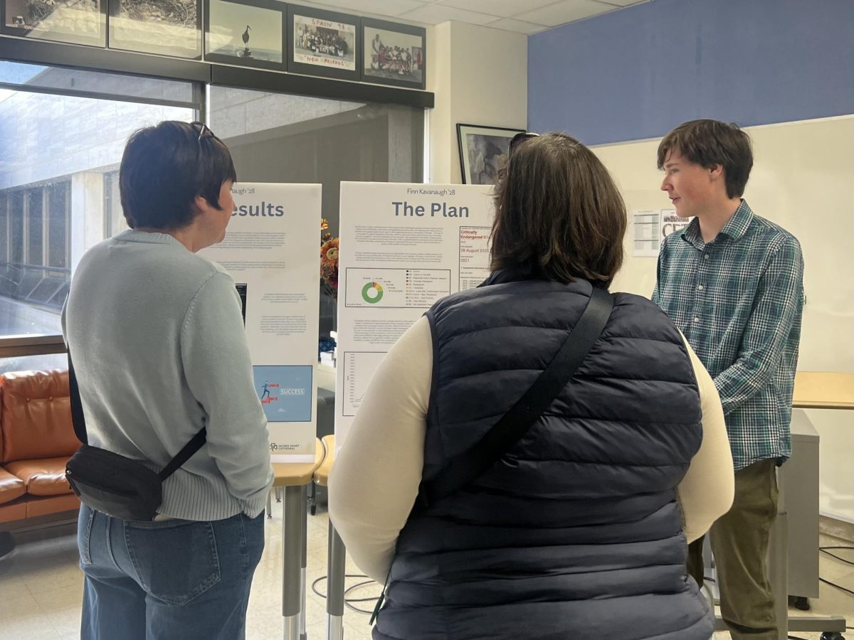 Finn Kavanaugh ‘28 explaining his i2 Project during the 2025 showcase. (Sam Wai '25)