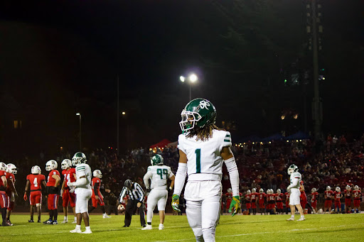 Michael Sargent 26’ #15 quarterback and Legend Williams 26’ #6 running back lined up for the opening prayer before the game. 