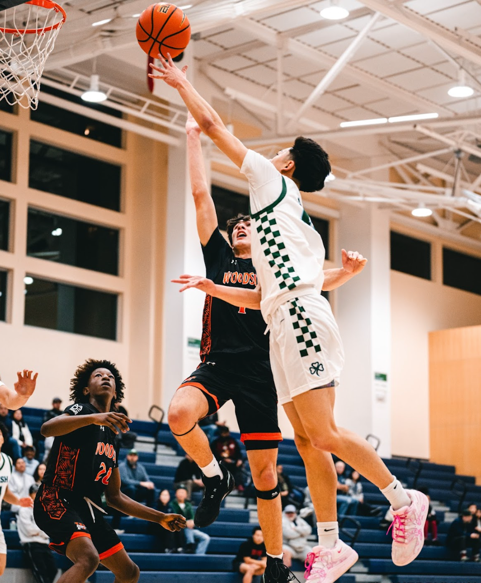 Cory Wong ‘26 going up for a layup.